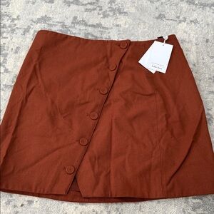 Brown button down asymmetrical mini skirt